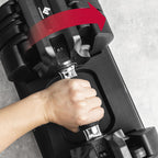 Регулируеми дъмбели FitEngine с 16 степени от 3 до 22.7 кг, гумирана дръжка и удобна поставка